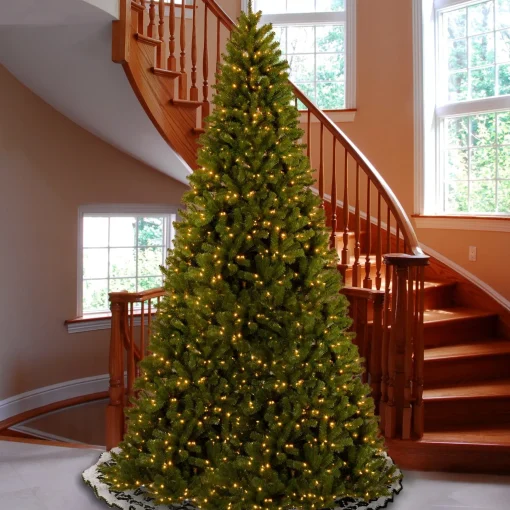 Clear-National Tree Company Pre-Lit Artificial Giant Christmas Tree, Green, North Valley Spruce, White Lights, Includes Stand, 16 Feet