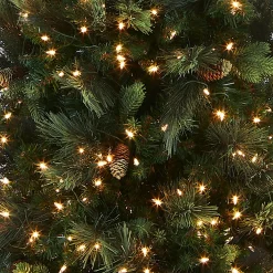 Slim-National Tree Company Pre-Lit Artificial Giant Slim Christmas Tree, Green, Carolina Pine, White Lights, Flocked With Pine Cones, Includes Stand, 12 Feet